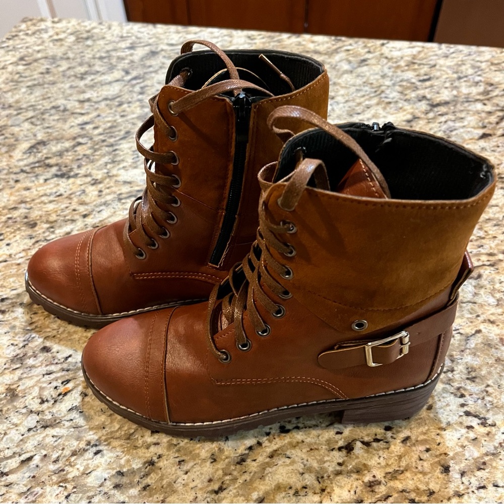 Brown buckle combat boots